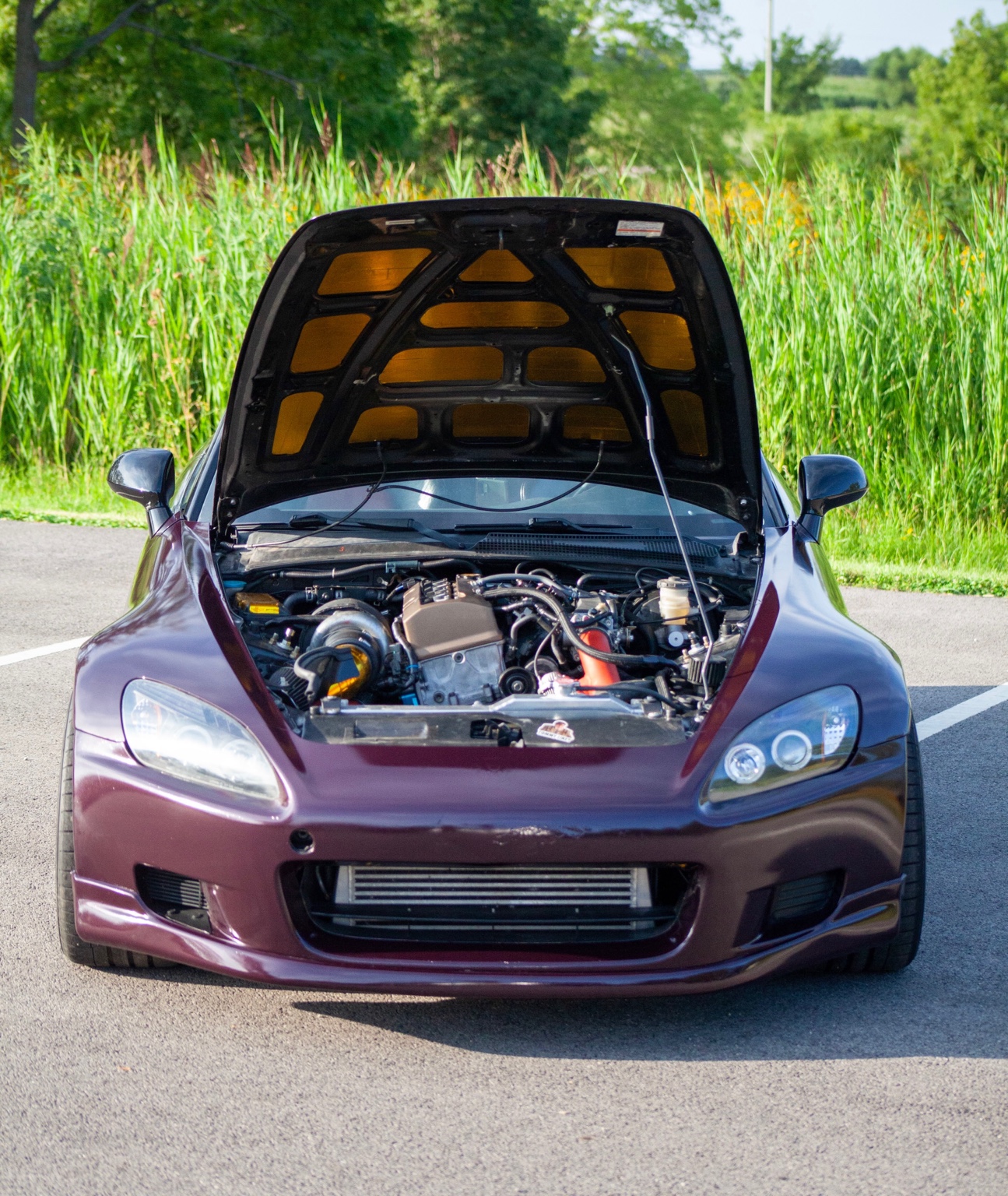 Front view of the Honda S2000 with its hood open